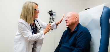 Dr. Heather Mudano examines a patient
